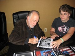 signing photo