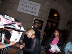 signing photo
