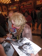 signing photo
