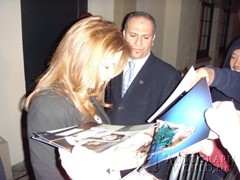 signing photo