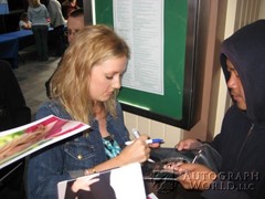signing photo