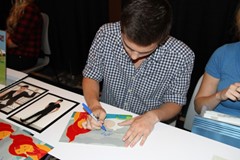 signing photo