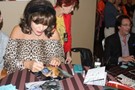 Joan Collins signing proof