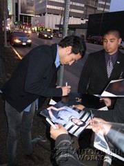 signing photo