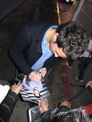 signing photo