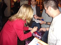signing photo