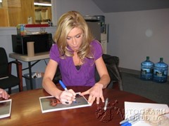 signing photo