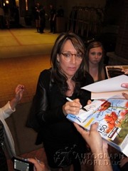 signing photo