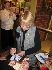 signing photo