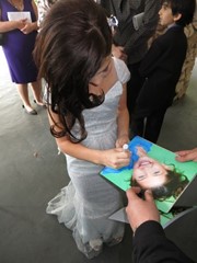 signing photo