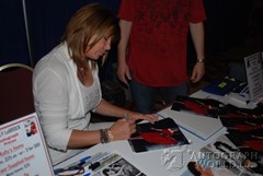 signing photo