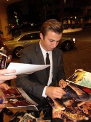 signing photo