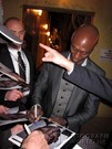 Lance Reddick signing proof