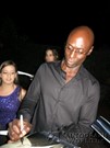 Lance Reddick signing proof