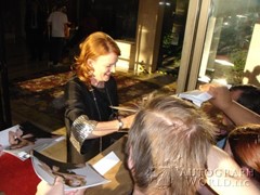 signing photo