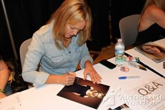 signing photo