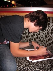 signing photo