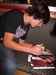 signing photo