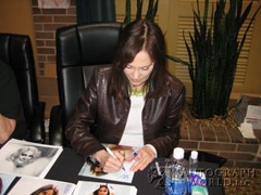 signing photo