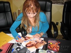 signing photo