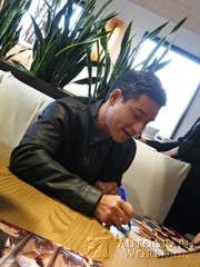 signing photo