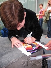 signing photo