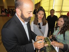 signing photo