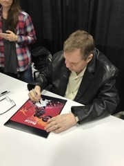 signing photo