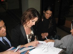 signing photo