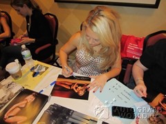 signing photo