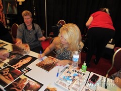 signing photo