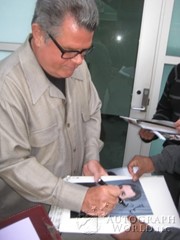 signing photo