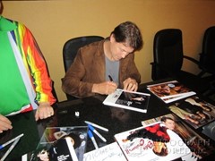 signing photo