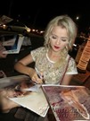 Mika Newton signing proof