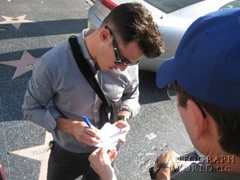 signing photo