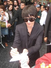 signing photo