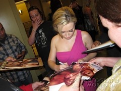 signing photo