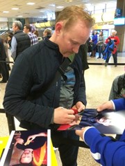 signing photo