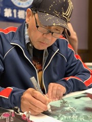 signing photo