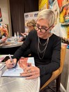 Nicole Eggert signing proof