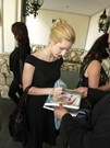 Nicole Tompkins signing proof