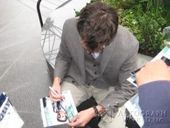 signing photo