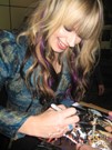 Orianthi Panagaris signing proof