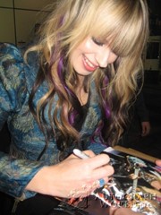signing photo