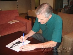 signing photo