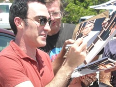 signing photo