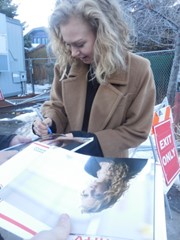 signing photo