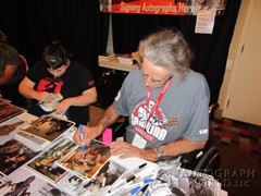 signing photo