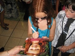 signing photo