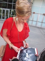 signing photo
